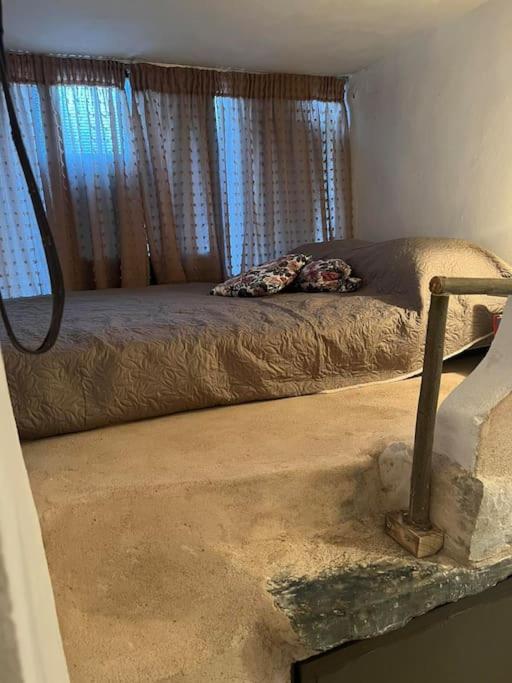 Postel nebo postele na pokoji v ubytování Λαγκάδι Μάνης