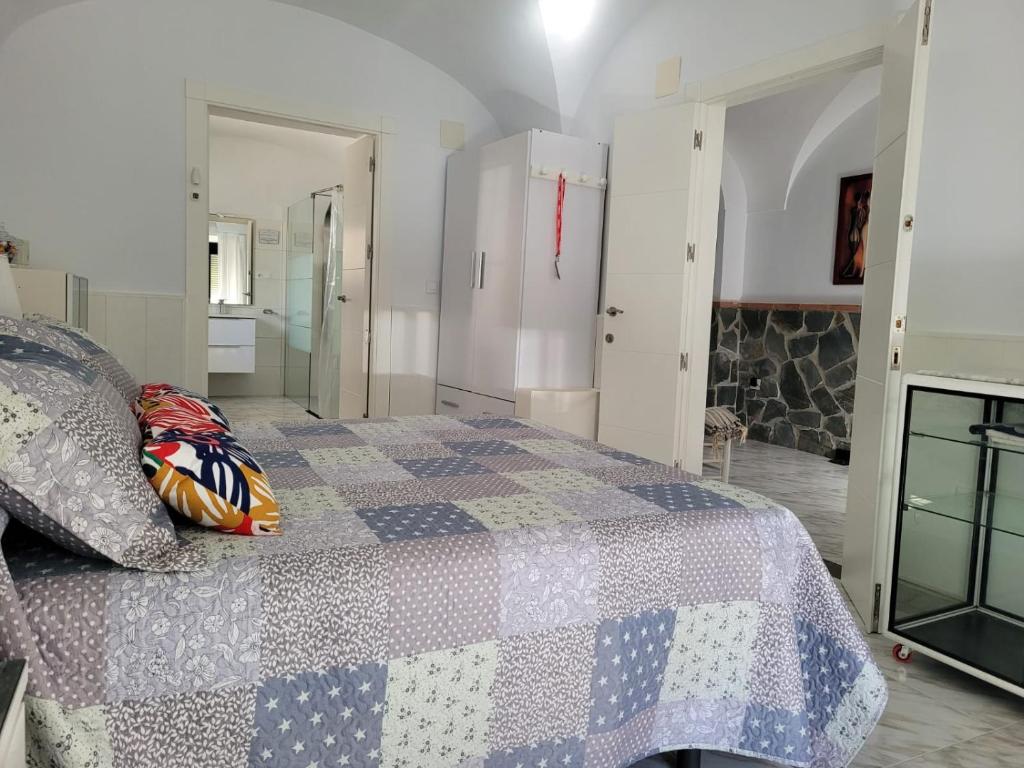 Łóżko lub łóżka w pokoju w obiekcie CASA VASCO