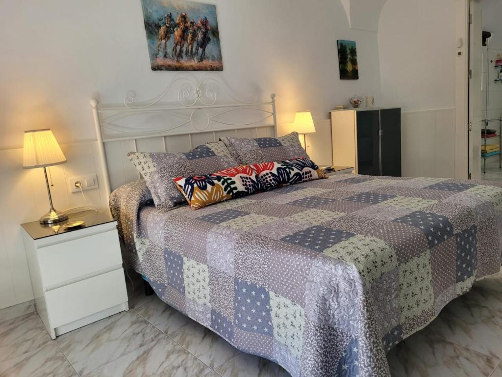 Łóżko lub łóżka w pokoju w obiekcie CASA VASCO