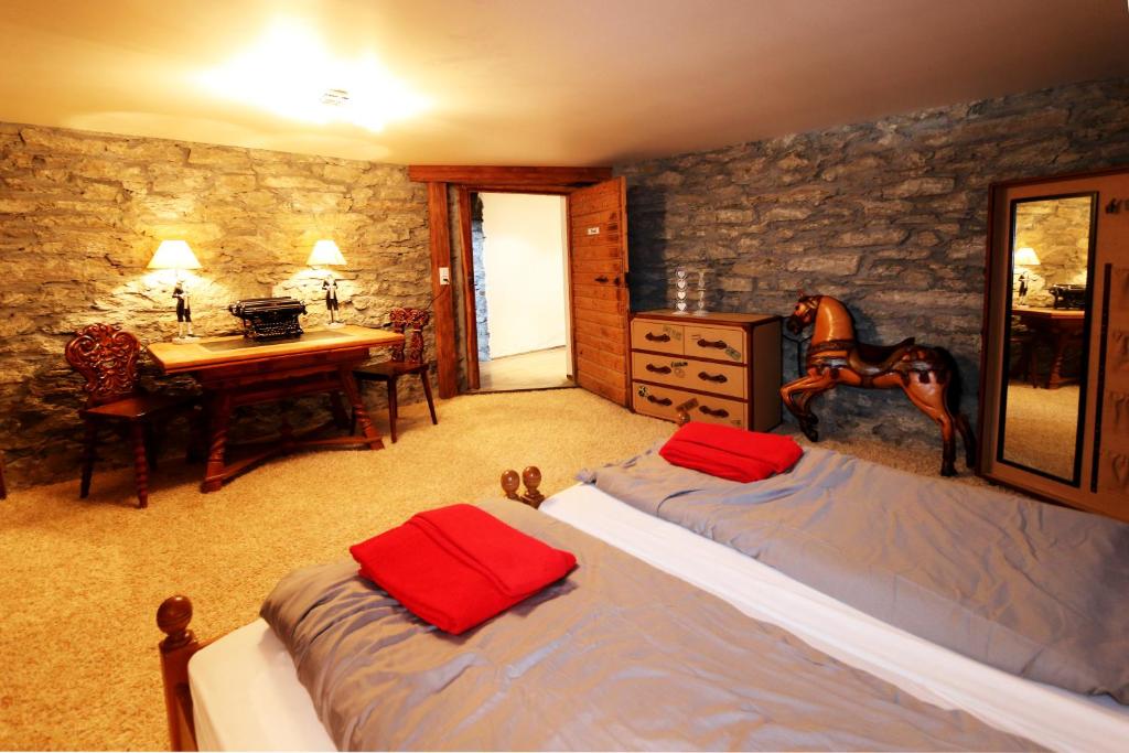Postel nebo postele na pokoji v ubytování Stegmatte - Unique luxury triplex apartment for 10 persons