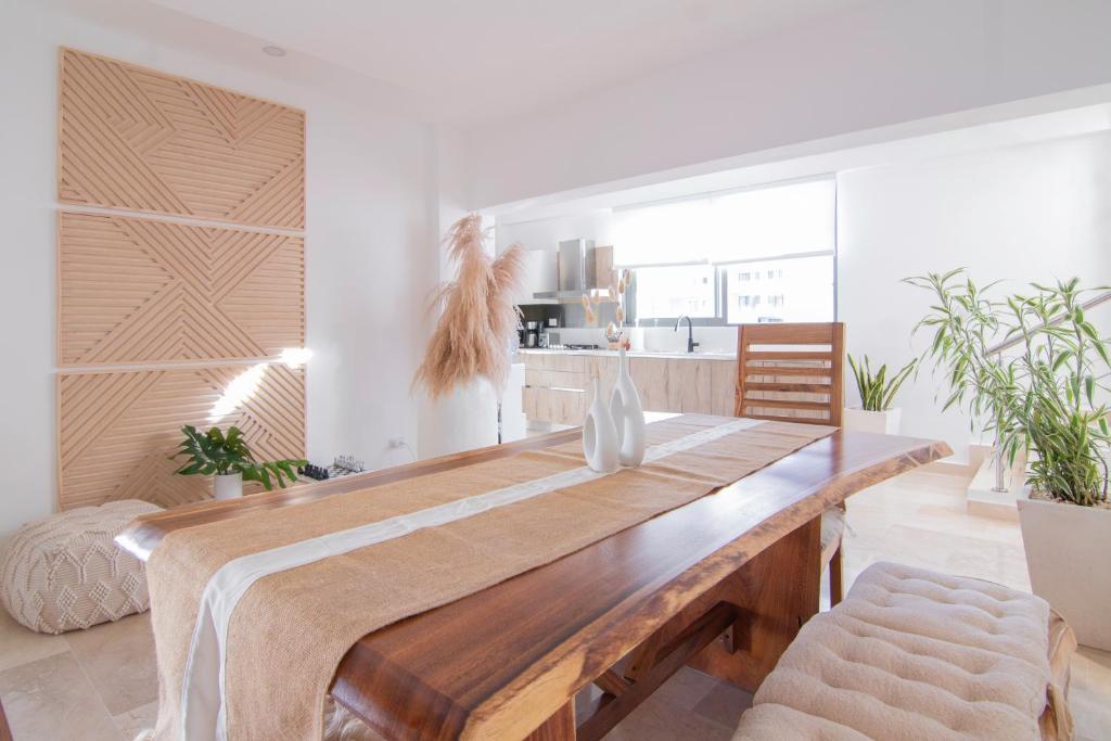 Postel nebo postele na pokoji v ubytování New Beachfront Penthouse Punta Popy