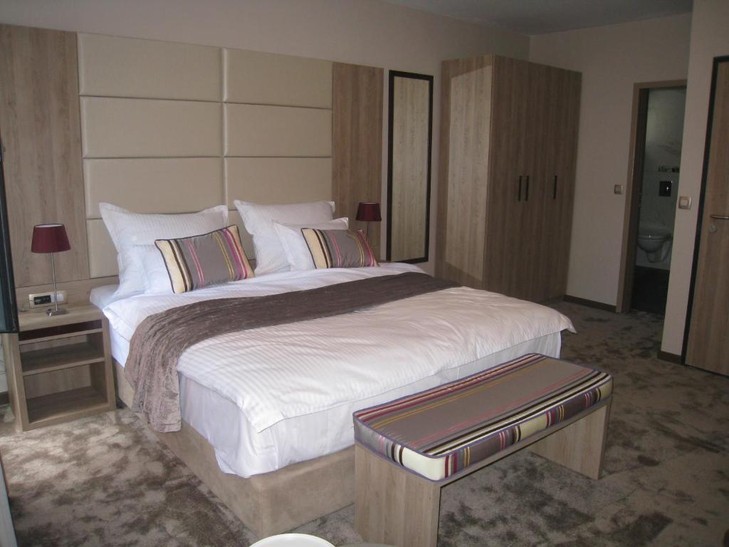 Postel nebo postele na pokoji v ubytování Hotel VIP