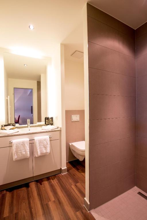 Koupelna v ubytování Carat Apartments Grömitz