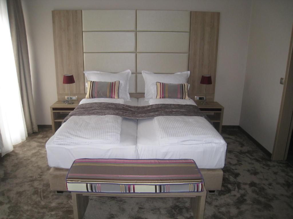 Postel nebo postele na pokoji v ubytování Hotel VIP