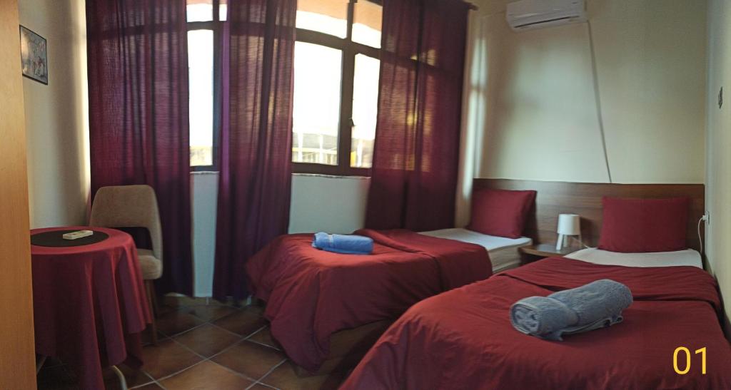 Cama o camas de una habitación en Hotel Kurtabeg