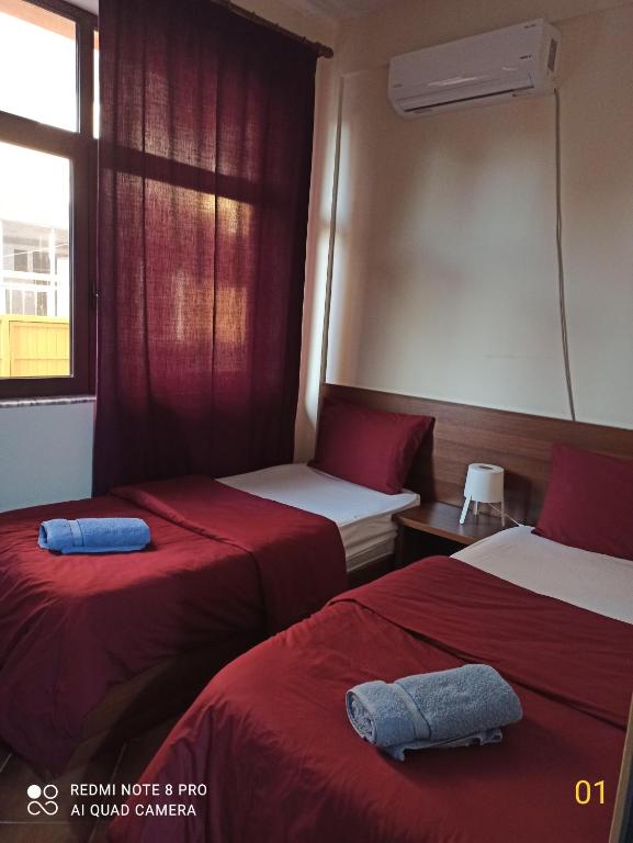 Cama o camas de una habitación en Hotel Kurtabeg