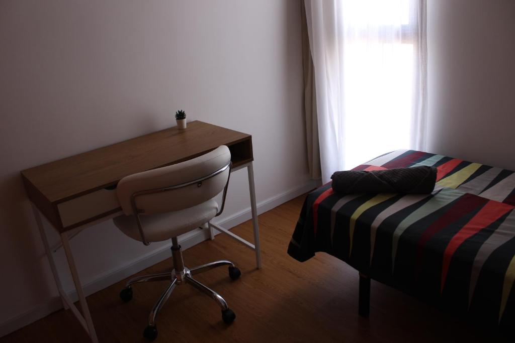 A bed or beds in a room at ROSET