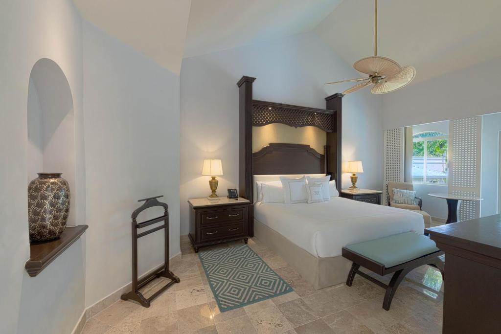 Кровать или кровати в номере Royal Hideaway Playacar All-Inclusive Adults Only Resort