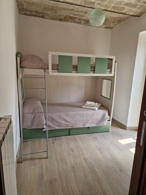 Postel nebo postele na pokoji v ubytování Casa la Matterella