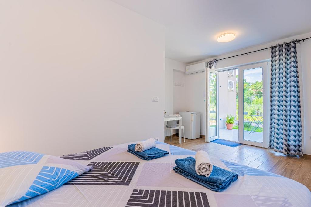 Postel nebo postele na pokoji v ubytování New 4 star Room M&A in town Cres