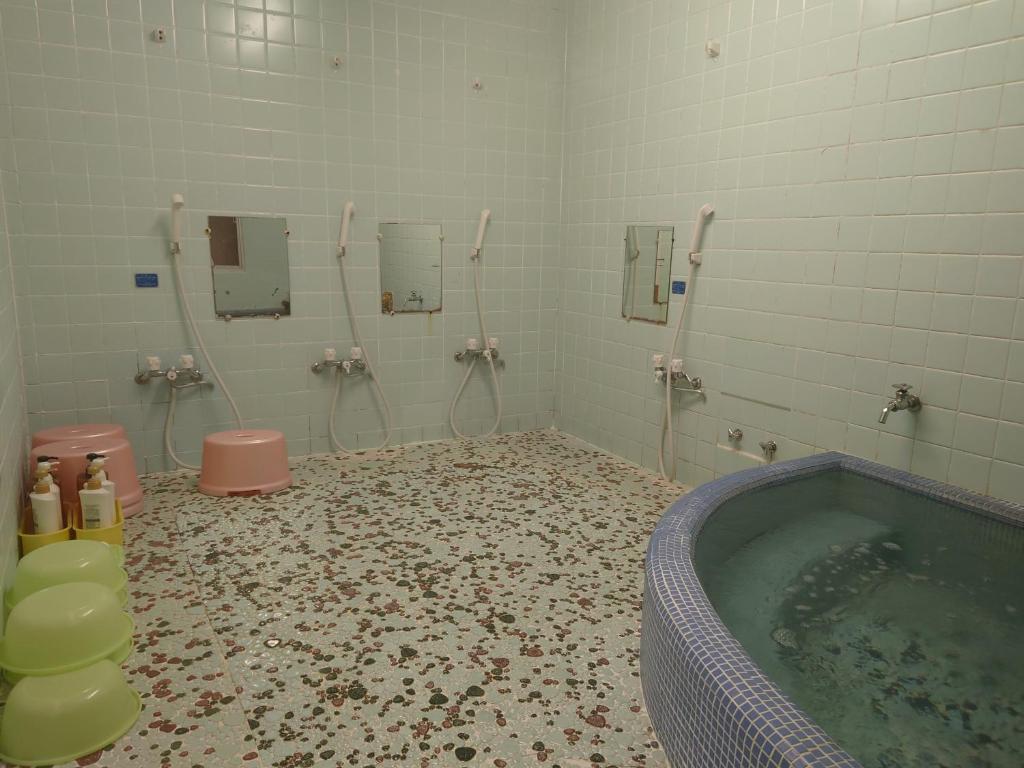 Koupelna v ubytování Takigawa Ryokan