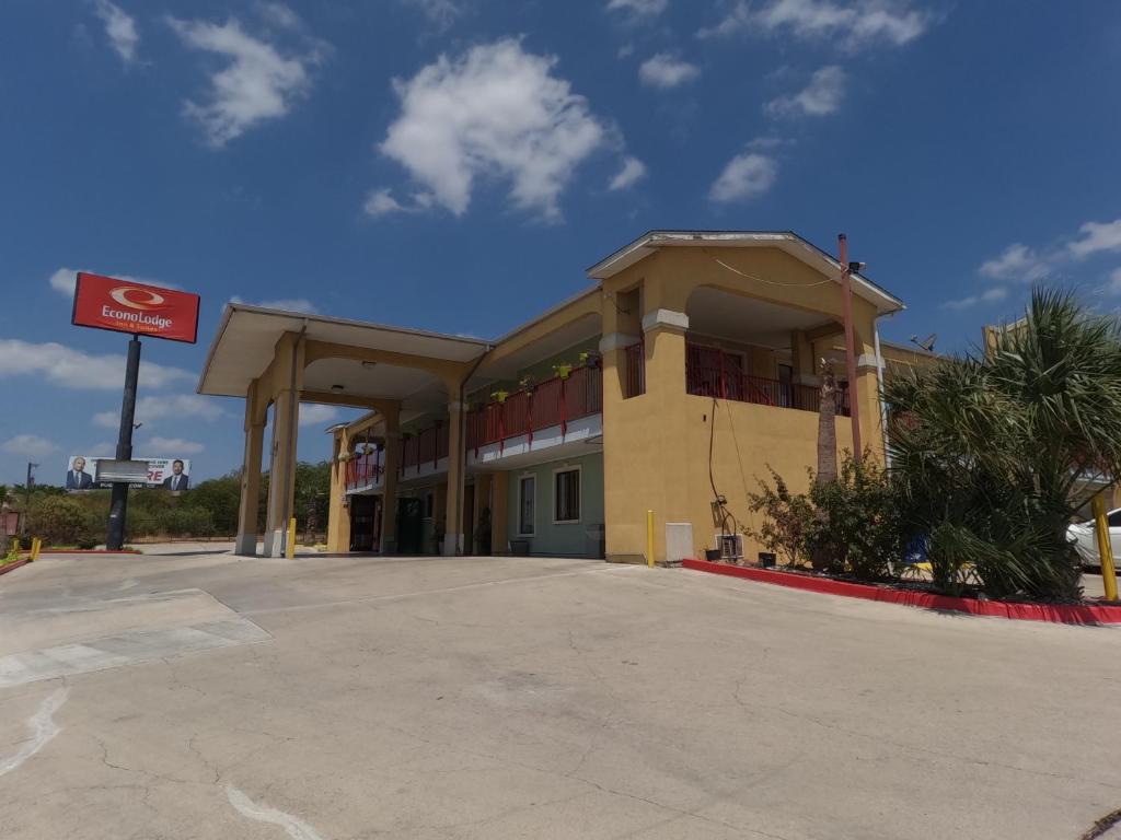 an empty parking lot in front of a building at Econo Lodge Inn & Suites San Antonio near Frost Bank Center in San Antonio