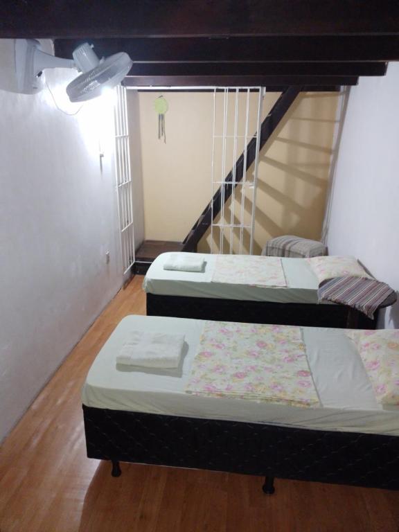 Postel nebo postele na pokoji v ubytování AXÉ HOME Martha & Jorge