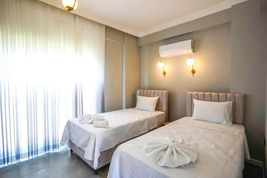 Postel nebo postele na pokoji v ubytování Dalyan Villa Alba