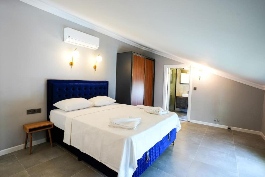 Postel nebo postele na pokoji v ubytování Dalyan Villa Alba