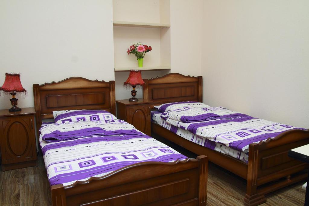 Postel nebo postele na pokoji v ubytování Inter Boutique Hotel