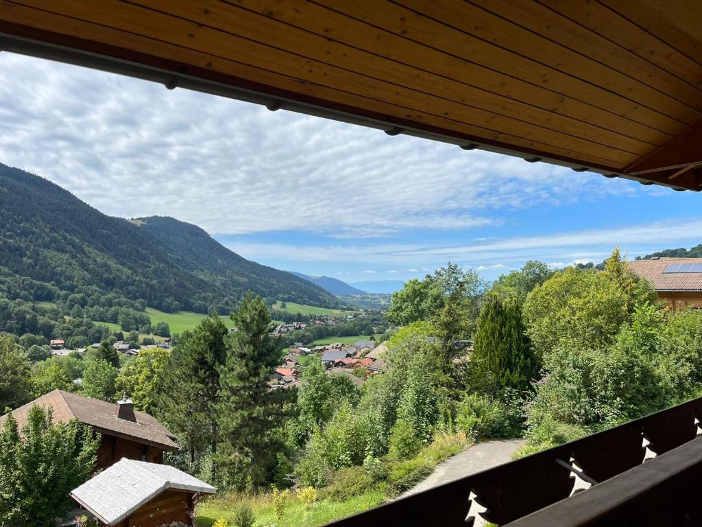 a view of a valley from a building at Chalet Bernex, 5 pièces, 10 personnes - FR-1-498-94 in Bernex