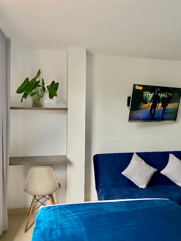 Postel nebo postele na pokoji v ubytování San Ignacio Hotel