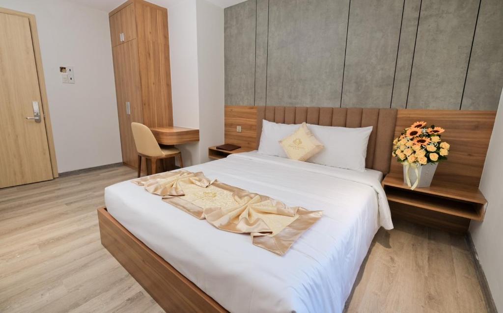 Postel nebo postele na pokoji v ubytování Prague Nha Trang