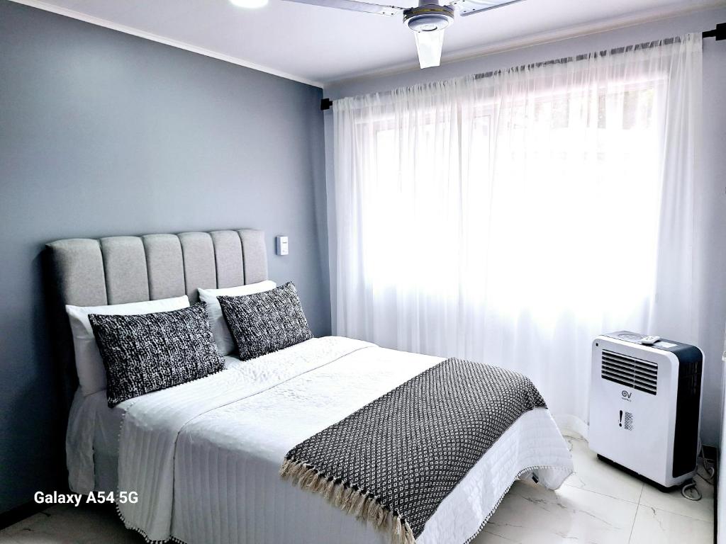 Postel nebo postele na pokoji v ubytování Casa Victoria CR