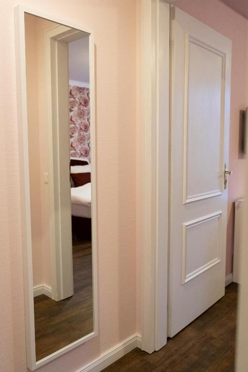 Postel nebo postele na pokoji v ubytování Rein Klassik Hotel