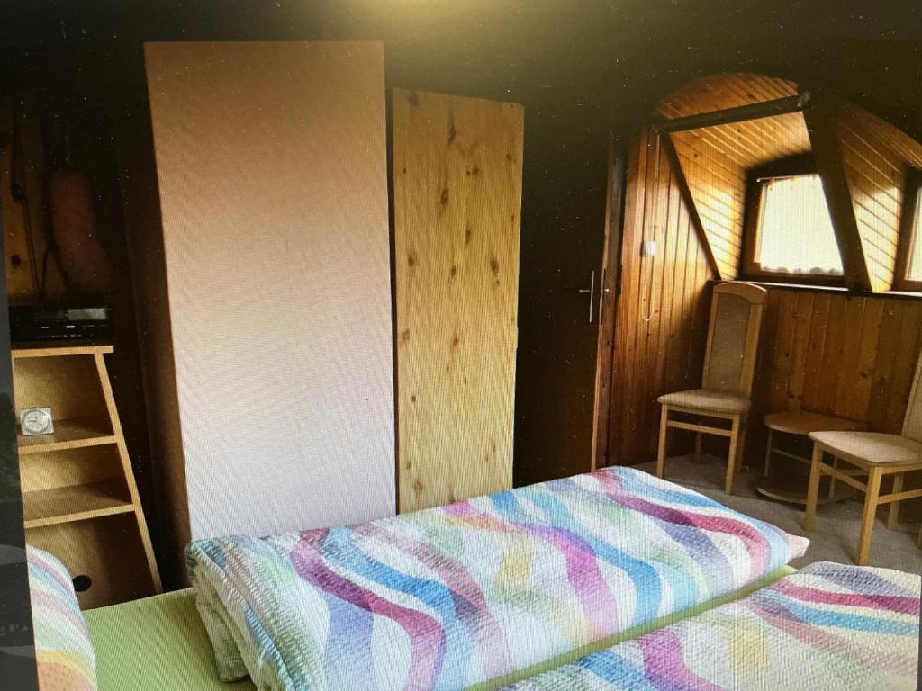 Postel nebo postele na pokoji v ubytování Ferienhaus Günther Harzgerode/Schielo