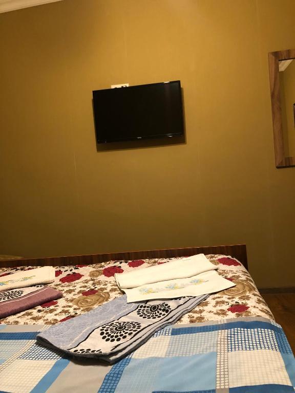 Voodi või voodid majutusasutuse Hotel Nikea Paradiso toas
