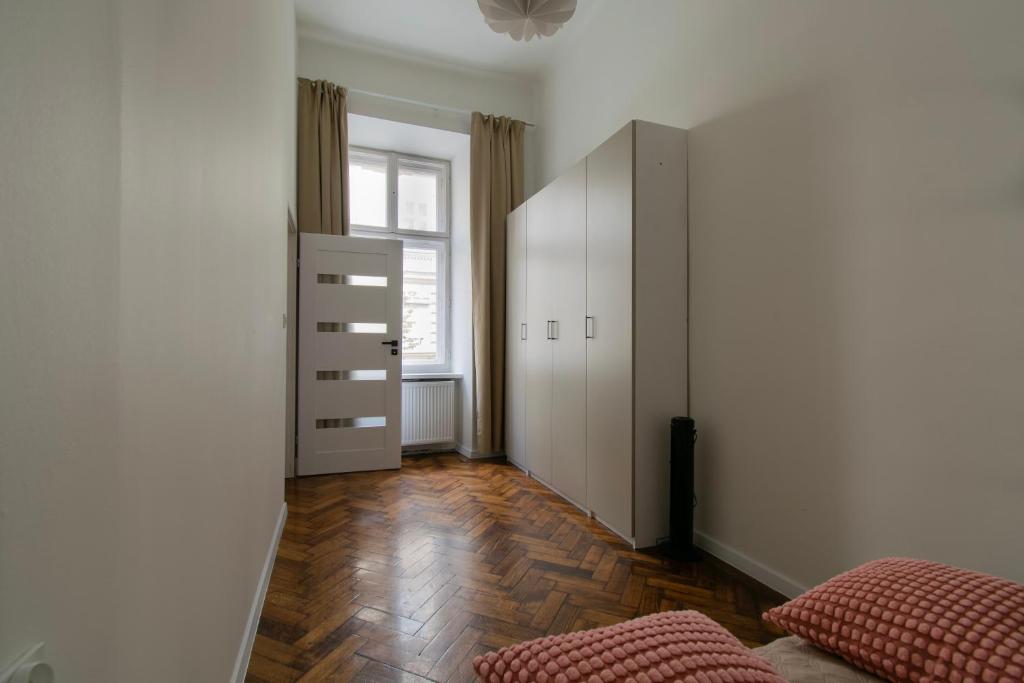 Posteľ alebo postele v izbe v ubytovaní Apartments Studencka Street, Next to Planty Park