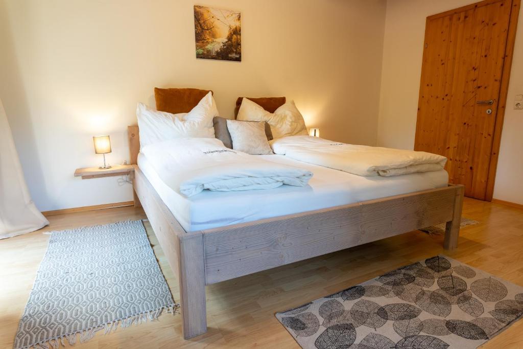Voodi või voodid majutusasutuse NaturparkResort Zu Hause toas