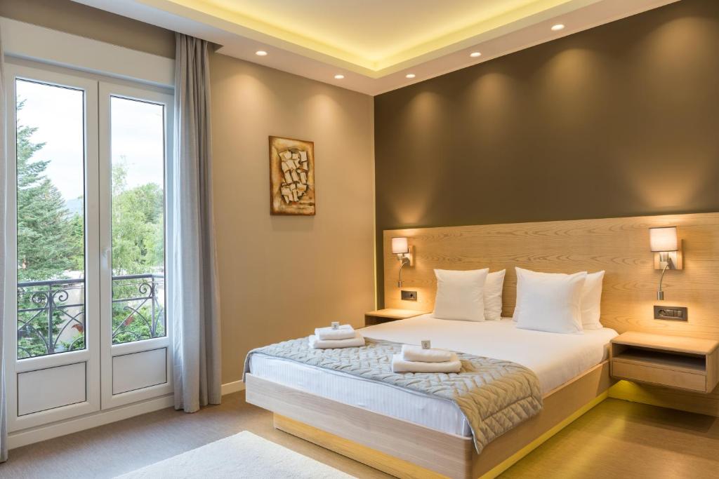 Postel nebo postele na pokoji v ubytování Emilia Lux Rooms