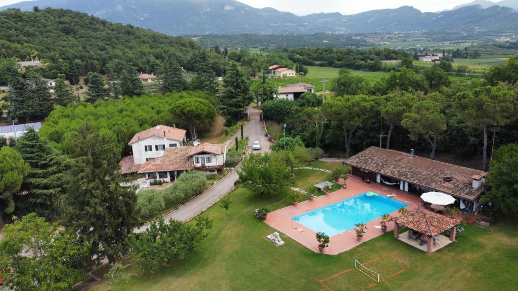 an aerial view of a house with a swimming pool at Eco Farm - La Cavallina in Rivoli Veronese