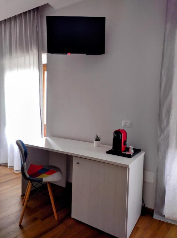 TV a/nebo společenská místnost v ubytování B&B Dimora Belvedere