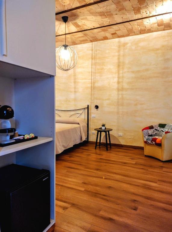 Postel nebo postele na pokoji v ubytování B&B Dimora Belvedere