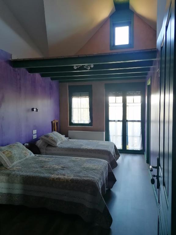 Postel nebo postele na pokoji v ubytování Hostería Casa Flor