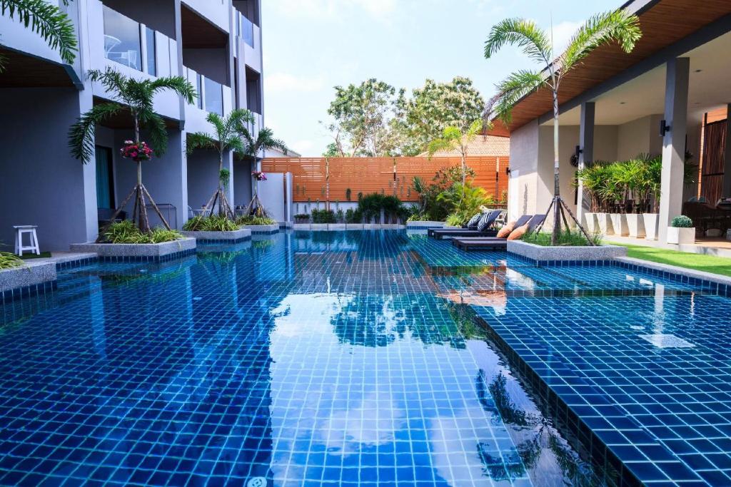 Bazén v ubytování Guuden Huahin Hotel nebo v jeho okolí