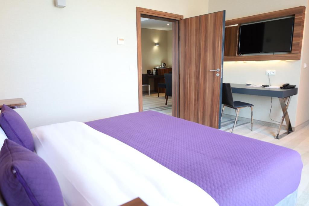 Posteľ alebo postele v izbe v ubytovaní Warsaw Plaza Hotel