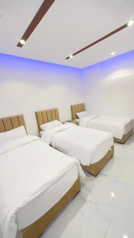 Postel nebo postele na pokoji v ubytování Mussa Spring Hotel