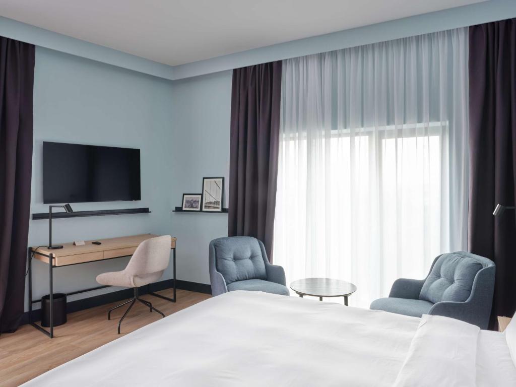 TV a/nebo společenská místnost v ubytování Radisson Hotel Budapest BudaPart