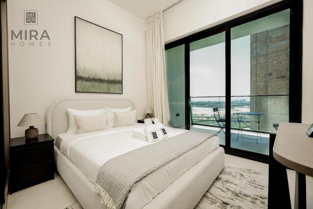 Postel nebo postele na pokoji v ubytování Mira Holiday Homes - Serviced 1 bedroom with canal view