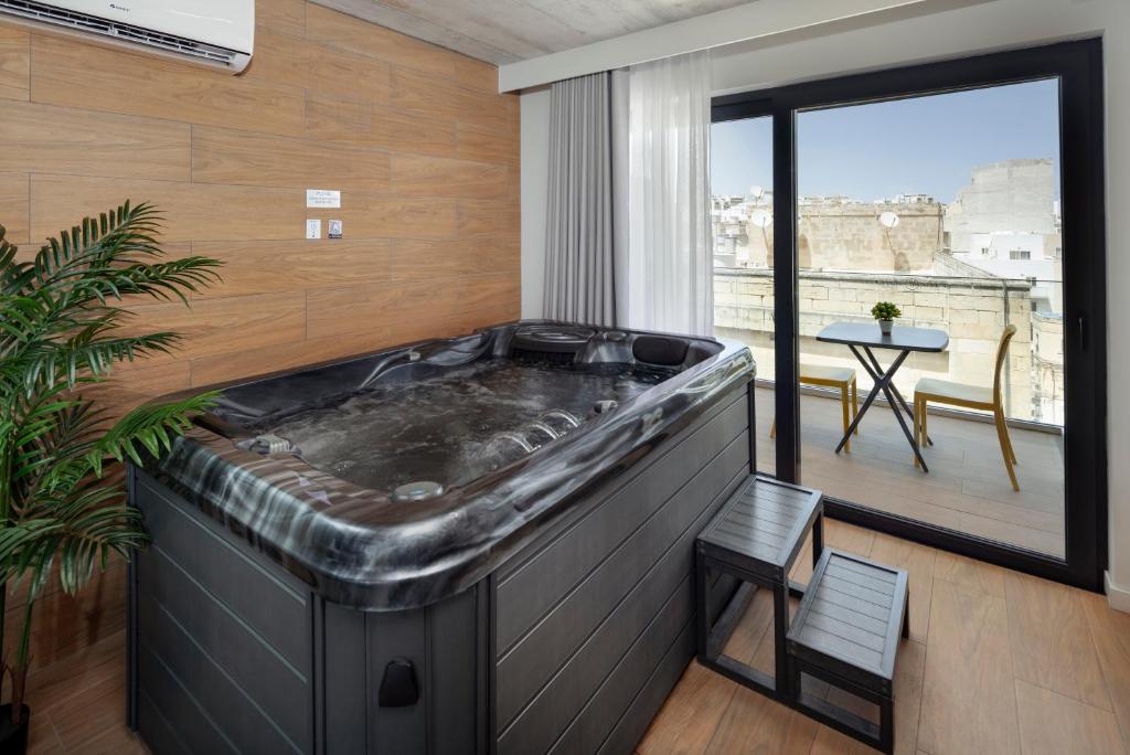 Fotografie z fotogalerie ubytování Grands Suites Hotel Residences and Spa v destinaci Gżira