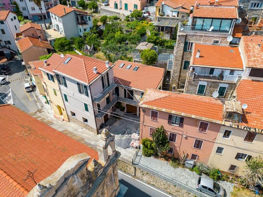 an aerial view of a city with orange roofs at Ginestra in Cipressa
