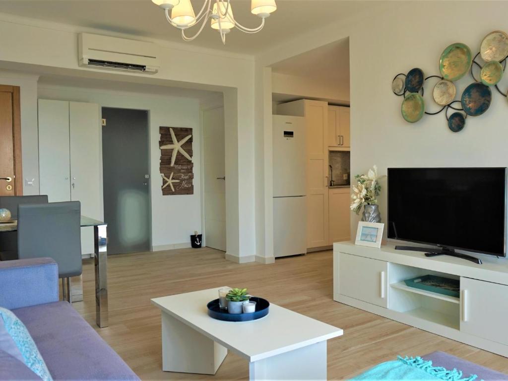 A television and/or entertainment centre at La perla del mar 2