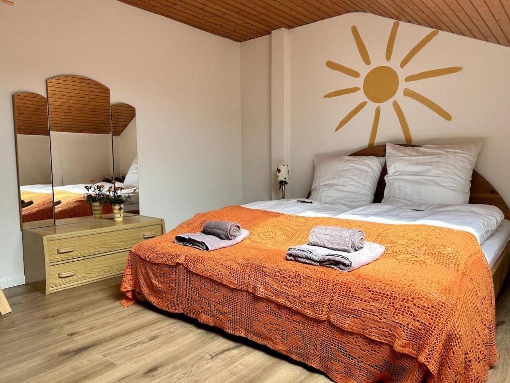 Natur Atempause Schwarzwald tesisinde bir odada yatak veya yataklar