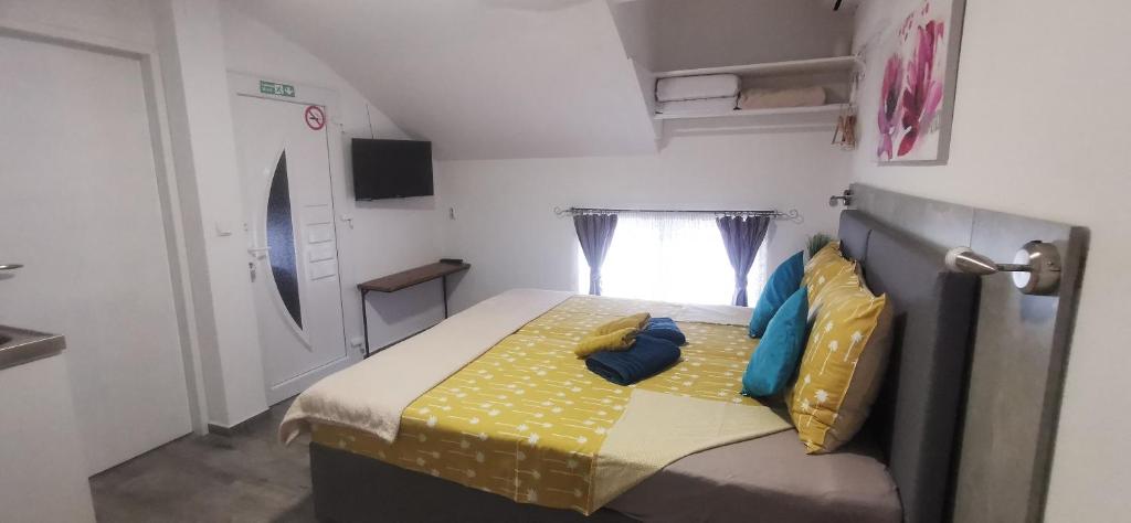Postel nebo postele na pokoji v ubytování ANA
