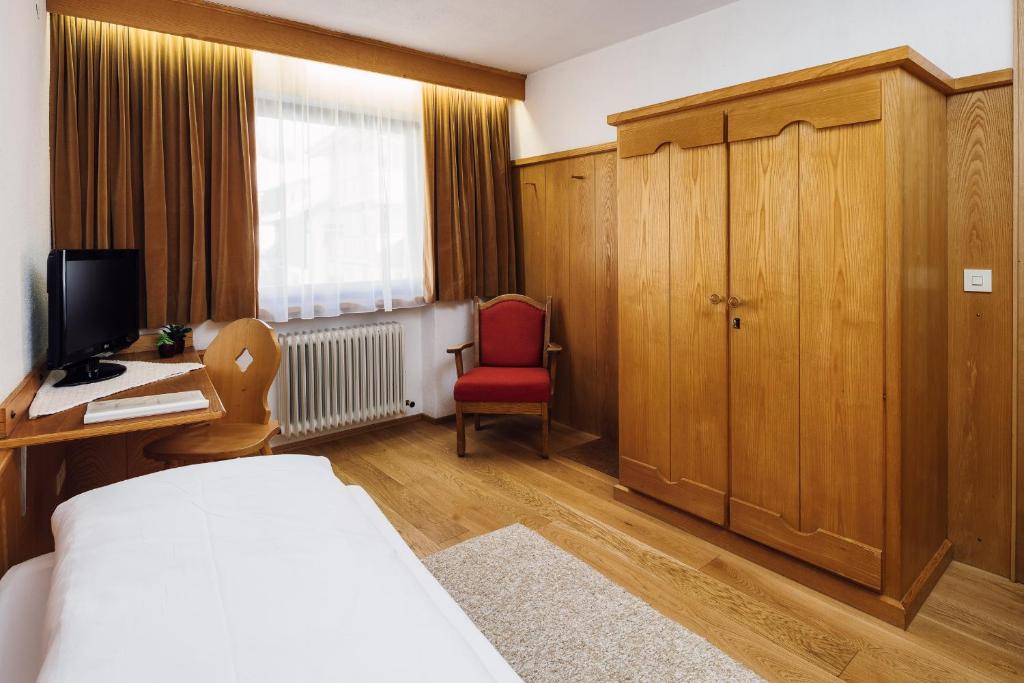 Postel nebo postele na pokoji v ubytování Hotel Komperdell