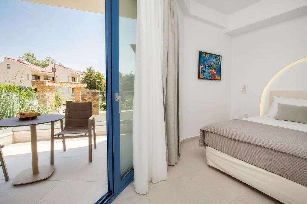 Postel nebo postele na pokoji v ubytování euphoria boutique hotel