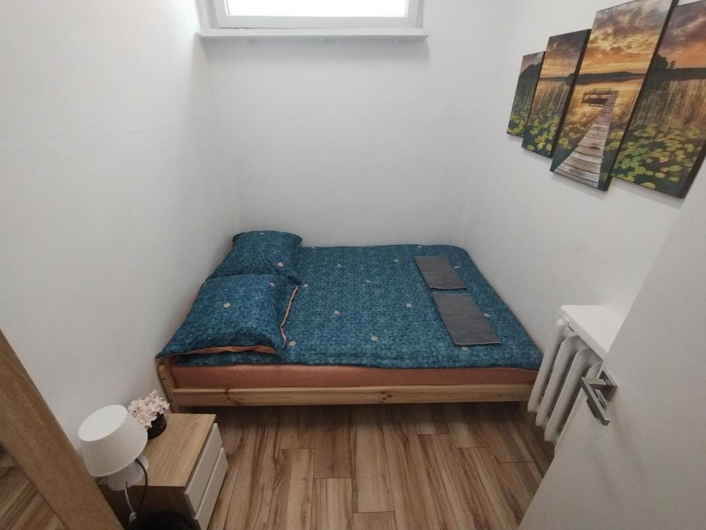Postel nebo postele na pokoji v ubytování VasylOk