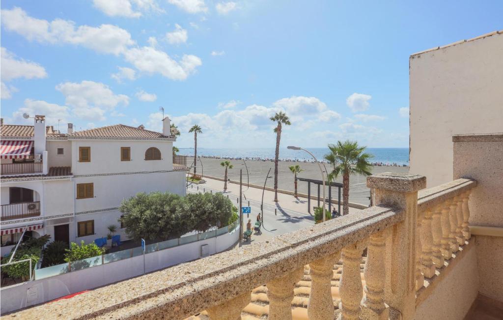 a view of the beach from the balcony of a building at Gorgeous Home In Santa Pola With Wifi in Santa Pola