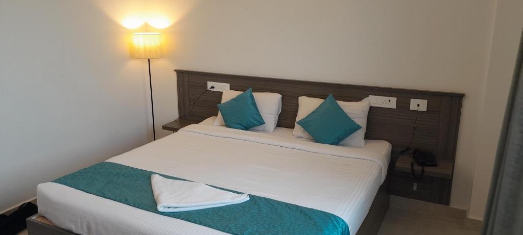 Postel nebo postele na pokoji v ubytování Le Poshe Beachview - TIE Hotels & Resorts