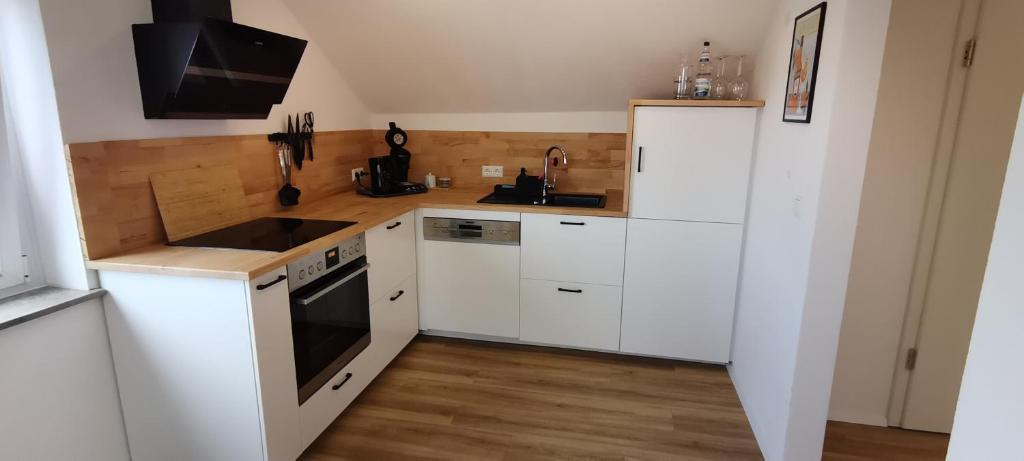 Kuchyň nebo kuchyňský kout v ubytování Ferienwohnung Rein
